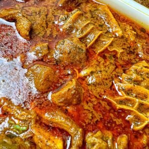 Banga soup (Ofe Akwu) with assorted meats