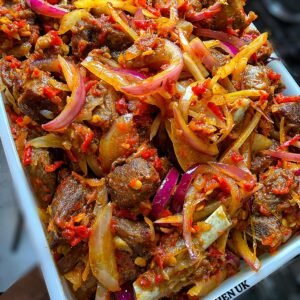 ASUN JOLLOF (cooked with Naija goat meat)